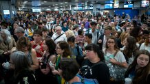 NEW YORK, NY - JUNE 19: Passengers line up to board a delayed Amtrak train at New York Penn Station, June 19, 2019 in New York City. Power outage issues on Amtrak and New Jersey Transit train lines halted all trains in and out of New York Penn Station on Wednesday morning. (Photo by Drew Angerer/Getty Images)