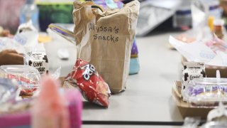 student lunches sit on a table in a Florida cafeteria