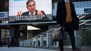 A monitor displaying a news broadcast on former Nissan Motor Co. Chairman Carlos Ghosn