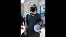 Alejandro, who did not wish to reveal his last name, 21, from Roxbury, at a protest in Roxbury on Wednesday, June 10, 2020.