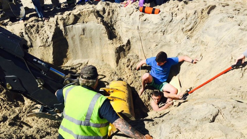 TLMD-Cape-Cod-marthas-vineyard-hoyo-casi-se-traga-a-excavador-en-la-playa