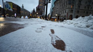 Footprints seen in downtown Boston on Wednesday, Dec. 18, 2019.
