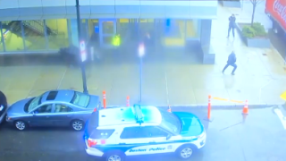 Still image from surveillance video of the Feb. 7 shooting outside Brigham and Women's Hospital in Boston