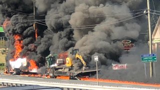 fire engulfs a vehicle after a crash on the Berlin Turnpike in Wethersfield