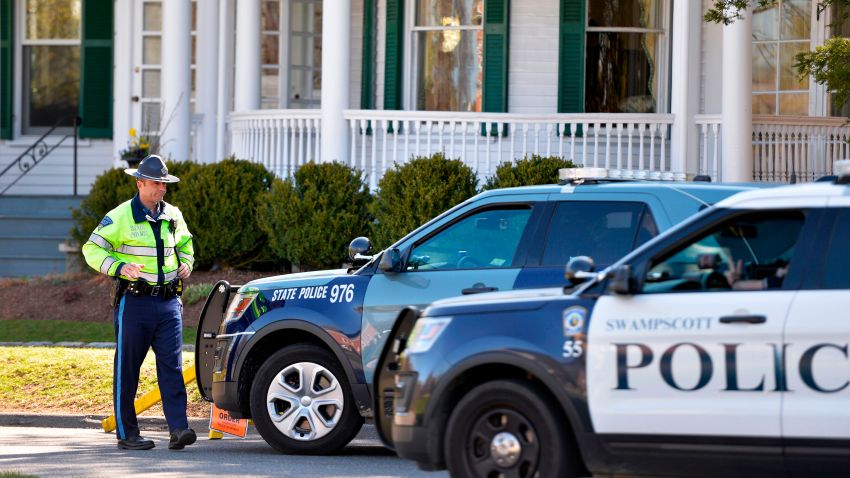 A state trooper outside the Swampscott home of Massachusetts Gov. Charlie Baker