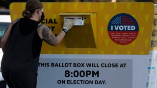 Voters cast ballots.