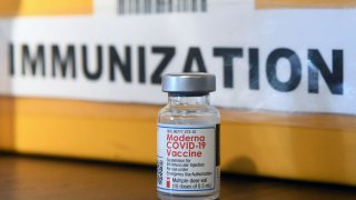 A Moderna COVID-19 vaccine vial (Photo by Paul Hennessy/NurPhoto via Getty Images)