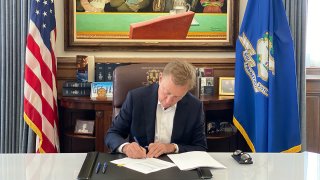 Governor Lamont signing online gambling bill
