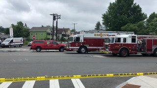 Firetrucks and other emergency vehicles on Pratt Street in Meriden.