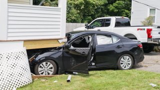 A car crashed into a house in Saugus, Massachusetts, on July 16, 2021.