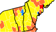 A map showing community transmission rates of COVID-19 in New Hampshire