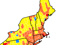 A map showing community transmission rates of COVID-19 in New England
