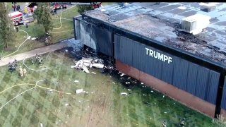 A plane after it crashed into a building in Farmington