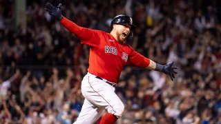 Christian Vazquez of the Boston Red Sox reacts after hitting a game-winning, walk-off, two-run home run during the 13th inning of Game 3of the 2021 American League Division Series against the Tampa Bay Rays at Fenway Park in Boston on Sunday Oct. 10, 2021.