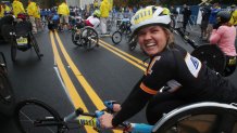 Hopkinton - October 11: Ev Houston prepares for her first the Women Wheel chair event in the 125th running of the Boston Marathon in Hopkinton, MA on October 11, 2021. It is the oldest annually run marathon in the world, with this years race being the milestone 125th running. This years race on October 11 will be the first fall edition of the Boston Marathon, and first time the race is held outside of its traditional Patriots Day date in April. Due to the coronavirus pandemic, the race was postponed. (Photo by Craig F. Walker/The Boston Globe via Getty Images)