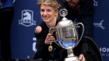 BOSTON, MASSACHUSETTS - OCTOBER 11: Manuela Schar of Switzerland poses with the Champion's Trophy after winning the women's wheelchair race during the 125th Boston Marathon on October 11, 2021 in Boston, Massachusetts. (Photo by Maddie Meyer/Getty Images)