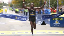 BOSTON, MASSACHUSETTS - OCTOBER 11: Benson Kipruto of Kenya reacts as he crosses the finish line to win the 125th Boston Marathon on October 11, 2021 in Boston, Massachusetts. (Photo by Maddie Meyer/Getty Images)