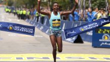 BOSTON, MASSACHUSETTS - OCTOBER 11: Diana Kipyogei of Kenya crosses the finish line to win the 125th Boston Marathon on October 11, 2021 in Boston, Massachusetts. (Photo by Maddie Meyer/Getty Images)