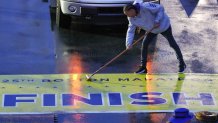 The Boston Marathon finish line got some finishing touches Monday morning before the 125th running of the race was underway.
