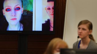 Julia Enright testifies during her murder trial on Friday, Nov. 19, 2021.