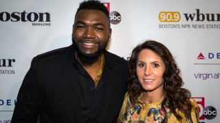 This November 2019 file photo shows former Boston Red Sox player David Ortiz and his wife, Tiffany Ortiz, pose during the red carpet event prior to the Pedro Martinez Foundation Gala at Mandarin Oriental in Boston.