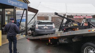 A car that crashed into a tent for coronavirus testing at Lawrence Memorial Hospital on Tuesday, Dec. 28, 2021.
