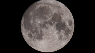 The moon over Lake Quannapowitt, Wakefield, Massachusetts.