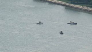 Search-and-rescue boats off of Carson Beach in Boston on Thursday, July 7, 2022.