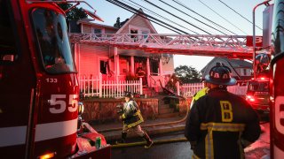 Crews on scene of a house fire in Roslindale