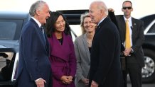 US President Joe Biden is greeted by US Senator Ed Markey (L) and Boston Mayor Michelle Wu (2nd L) on arrival at Boston Logan International Airport on December 2, 2022, in Boston, Massachusetts. (Photo by SAUL LOEB / AFP) (Photo by SAUL LOEB/AFP via Getty Images)