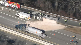 A truck crash on I-95 in Woburn, Massachusetts, closed an on-ramp and at least two lanes of the highway Friday, Jan. 27, 2023.