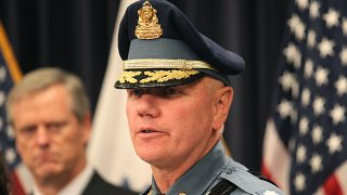 This Nov. 13, 2019, file photo shows Christopher Mason being named new head of the Massachusetts State Police at the State House in Boston by Massachusetts Gov. Charlie Baker.