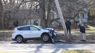 A damaged SUV at the scene of a crash in Needham, Massachusetts, that sent a pedestrian to the hospital on Thursday, Feb. 2, 2023.