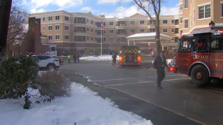 Firefighters at Newbury Court in Concord, Massachusetts, where a gas leak was under investigation on Wednesday, March 15, 2023.