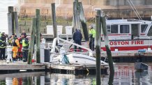 A sunken boat in Chelsea, Massachusetts, on Tuesday, April 4, 2023.