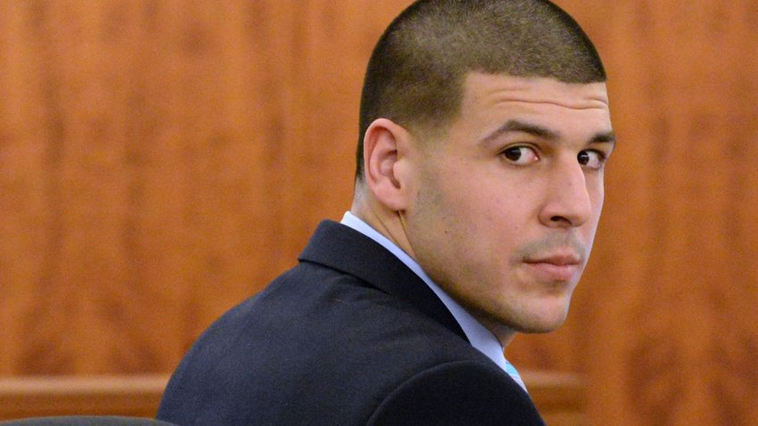 Former New England Patriots football player Aaron Hernandez looks back during his murder trial at Bristol County Superior Court, Thursday, Feb. 5, 2015, in Fall River, Mass. Hernandez is accused of the June 2013 killing of Odin Lloyd. (AP Photo/Faith Ninivaggi, Pool)