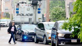 Police at the scene of a deadly shooting in Mansfield, Massachusetts, on Saturday, May 20, 2023.