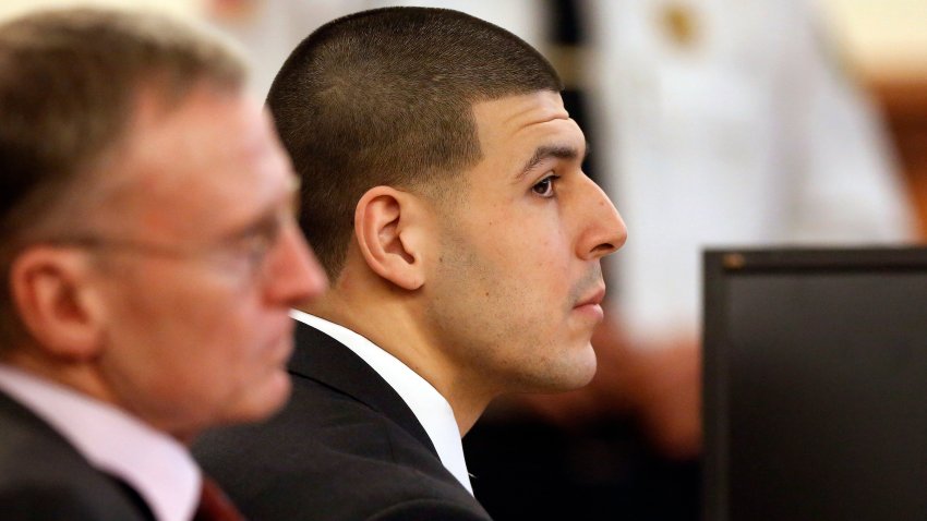 Former New England Patriots football player Aaron Hernandez, right, listens during his murder trial as defense attorney Charles Rankin, left, looks on, Thursday, Jan. 29, 2015, in Fall River, Mass. Hernandez is charged with killing semiprofessional football player Odin Lloyd, 27, in June 2013. (AP Photo/Steven Senne, Pool)