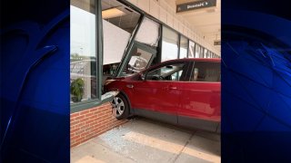 An SUV crash at a dental office in Newburyport, Massachusetts, on Tuesday, June 6, 2023.
