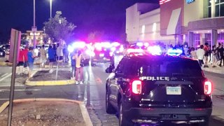 Police responded to the parking lot of the Cinemark Theatre in Manchester after reports of a large crowd.
