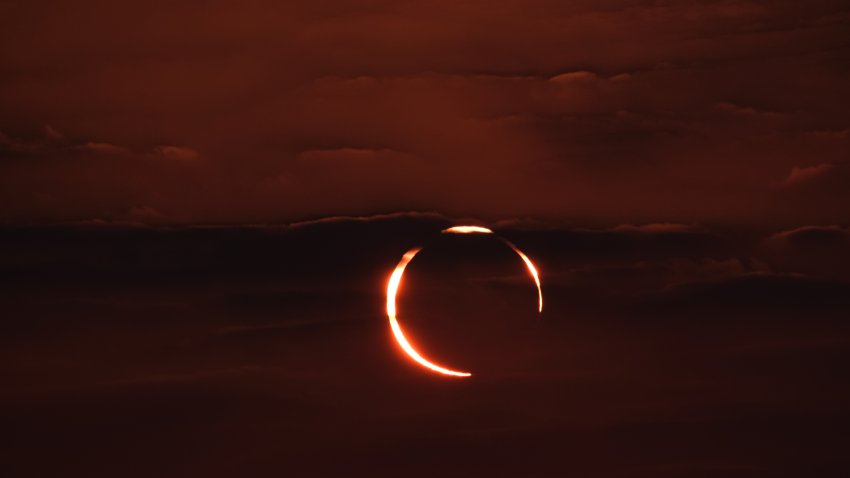 December 26, 2019. The rare Annular “ring of fire” solar eclipse as seen from the Corniche road in Doha, Qatar. Annular eclipses occur when the Moon is not close enough to the Earth to completely obscure the Sun, leaving a thin ring of the solar disc visible.