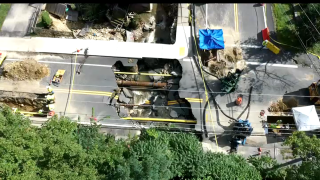 A massive hole in a Leominster street, pictured from above on Sept. 12, 2023.