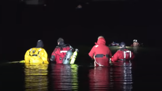 First responders shown rescuing from a car in the water on Sept. 25, 2023.