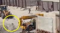 Con todo y el perro, migrantes aprovechan construcción en Playas de Tijuana para cruzar la frontera