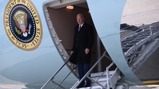 President Joe Biden disembarks from Air Force One upon arrival at Manchester-Boston Regional Airport in Manchester, New Hampshire, on Monday, March 11, 2024.