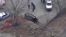 A crashed car in the parking lot of a Shaw's supermarket in Boston's Hyde Park neighborhood on Monday, March 18, 2024.