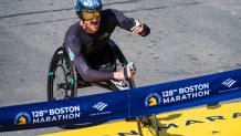 Swiss athlete Marcel Hug takes first place in the men's wheelchair professional field in the 128th Boston Marathon on April 15, 2024, in Boston, Massachusetts. The marathon includes around 30,000 athletes from 129 countries running the 26.2 miles from Hopkinton to Boston, Massachusetts. The event is the world's oldest annually run marathon. (Photo by Joseph Prezioso / AFP) (Photo by JOSEPH PREZIOSO/AFP via Getty Images)