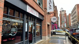 Broken door at Vinas Wine and Tapas in New Haven