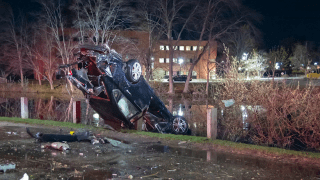 An upside-down car in Nashua, New Hampshire, on Monday, April 22, 2024. At least one person died in the crash.