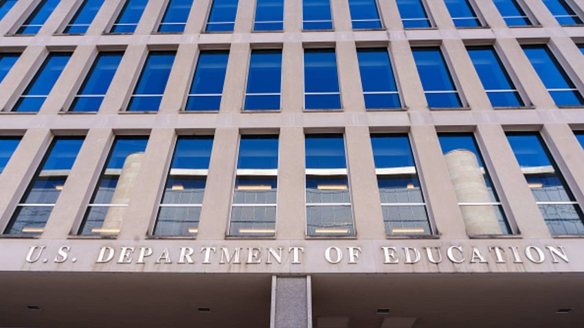 The US Department of Education sign hangs over the entrance to the federal building housing the agency’s headquarters in Washington, D.C., Feb. 9, 2024.